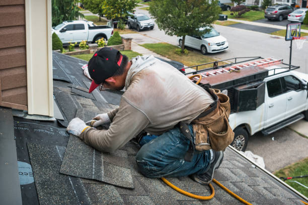 Professional Roofing technician working in Fall River, WI